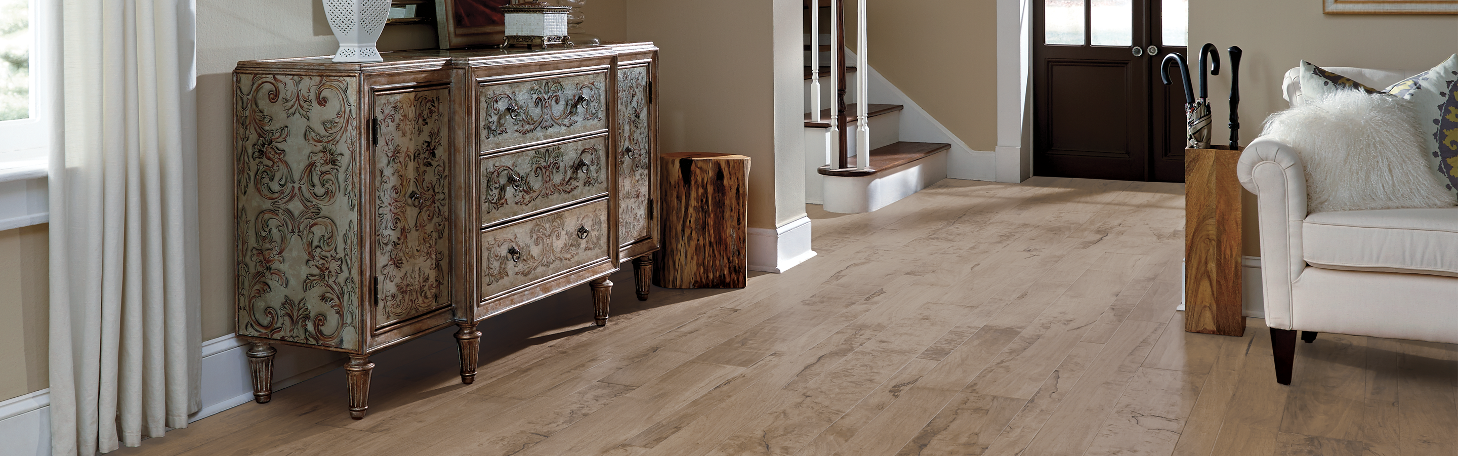 weathered hardwood flooring in entry way